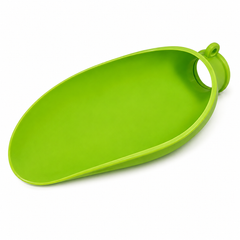 A bright lime green silicone scoop with a loop handle, shown on a clean white background.